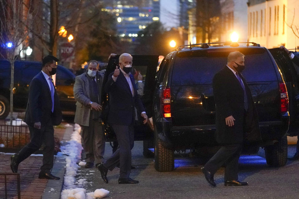 President Joe Biden gestures as he walks to a motorcade vehicle after attending Mass at Holy Trinity Catholic Church, Saturday, Feb. 20, 2021, in the Georgetown neighborhood of Washington. (AP Photo/Patrick Semansky)