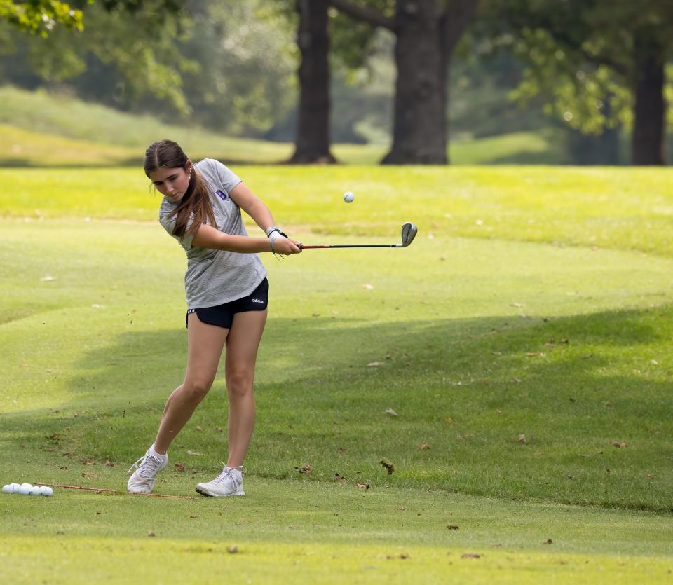 Bloomington South junior Kirin Bowden works on her chipping at practice at Bloomington Country Club on Monday, August 19, 2024.