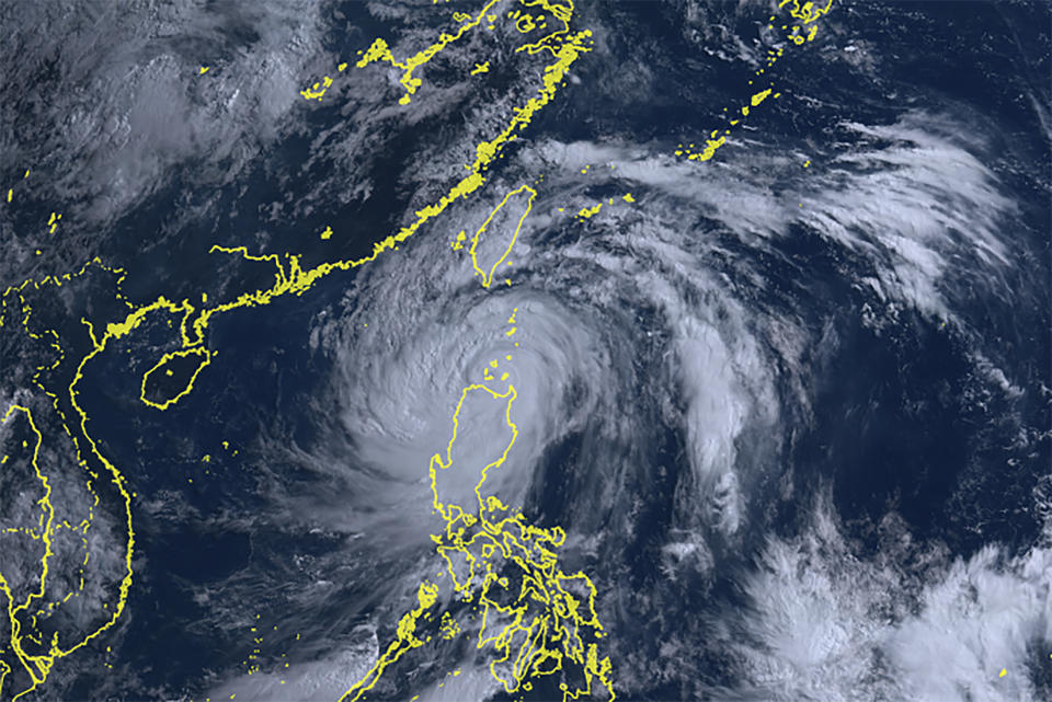 This satellite image taken by Himawari-8, a Japanese weather satellite, and provided by National Institute of Information and Communications Technology, shows Typhoon Doksuri in the middle Wednesday, July 26, 2023. (Courtesy of National Institute of Information and Communications Technology (NICT) via AP)