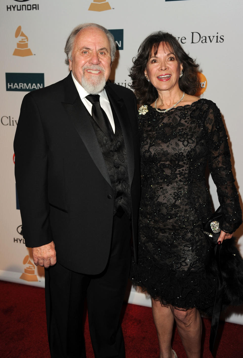 BEVERLY HILLS, CA - FEBRUARY 11: Producer George Schlatter (L) and Jolene Brand arrive at Clive Davis and the Recording Academy's 2012 Pre-GRAMMY Gala and Salute to Industry Icons Honoring Richard Branson held at The Beverly Hilton Hotel on February 11, 2012 in Beverly Hills, California. (Photo by Kevin Winter/Getty Images)