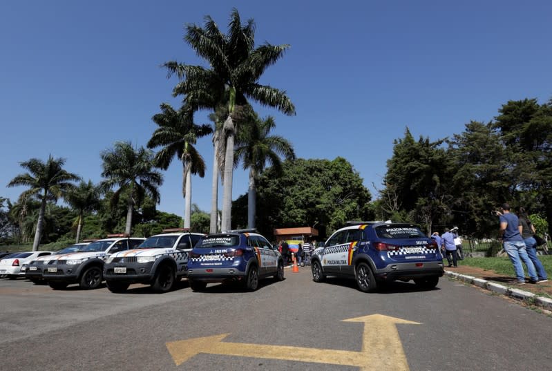 Police cars are seen outside Venezuelan embassy in Brasilia