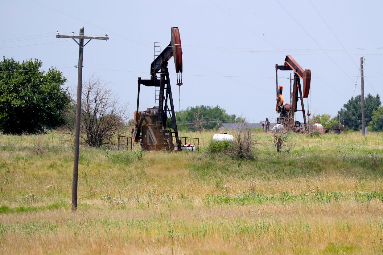 Oil well pumpjacks are seen in 2023 near Davis.