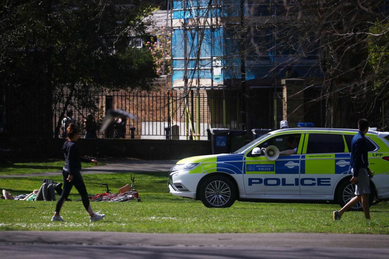 A police car is seen in Greenwich Park during the UK lockdown: REUTERS