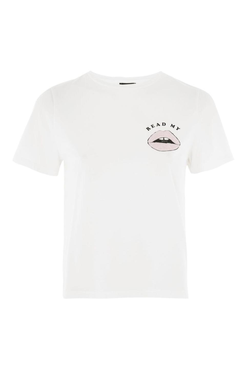 <p>'Read My Lips' Slogan T-Shirt. Available at <a rel="nofollow noopener" href="http://www.topshop.com/en/tsuk/product/read-my-lips-slogan-t-shirt-6838912?geoip=noredirect&cmpid=ppc_pla_UK_ip&utm_medium=cpc&tsrc=vdna&istCompanyId=38aa0d7f-6514-4cb3-bbdc-df0d32d48b7f&istItemId=xmwrilwxrp&istBid=tztx&gclid=EAIaIQobChMIqaClxPDM1QIVCxOPCh2glATmEAQYBCABEgIzYfD_BwE&gclsrc=aw.ds" target="_blank" data-ylk="slk:Topshop - £16;elm:context_link;itc:0;sec:content-canvas" class="link ">Topshop - £16</a></p>