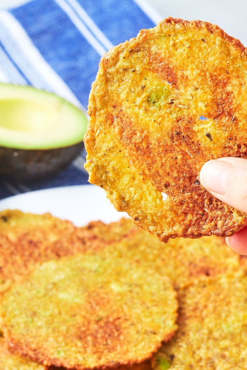 <p>These avo' crisp babies are a healthy alternative to your average shop bought ready salted crisps. Make a big batch and you've got snacks sorted for the whole week.</p><p>Get the <a href="https://www.delish.com/uk/cooking/recipes/a28996170/avocado-chips-recipe/" rel="nofollow noopener" target="_blank" data-ylk="slk:Avocado Crisps;elm:context_link;itc:0;sec:content-canvas" class="link ">Avocado Crisps</a> recipe.</p>