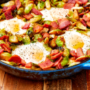 <p>We already loved all the things we could do with Brussels sprouts, but then we fried them in bacon fat <em>then</em> topped with crispy bacon and over easy eggs. We might never be the same. <br><br>Get the <strong><a href="https://www.delish.com/cooking/recipe-ideas/recipes/a58136/brussels-sprouts-hash-recipe/" rel="nofollow noopener" target="_blank" data-ylk="slk:Brussels Sprouts Hash recipe;elm:context_link;itc:0;sec:content-canvas" class="link ">Brussels Sprouts Hash recipe</a>.</strong> </p>