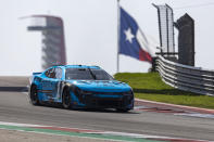 Ross Chastain steers through Turn 8 during a NASCAR Cup Series auto race at Circuit of the Americas, Sunday, March 26, 2023, in Austin, Texas. (AP Photo/Stephen Spillman)
