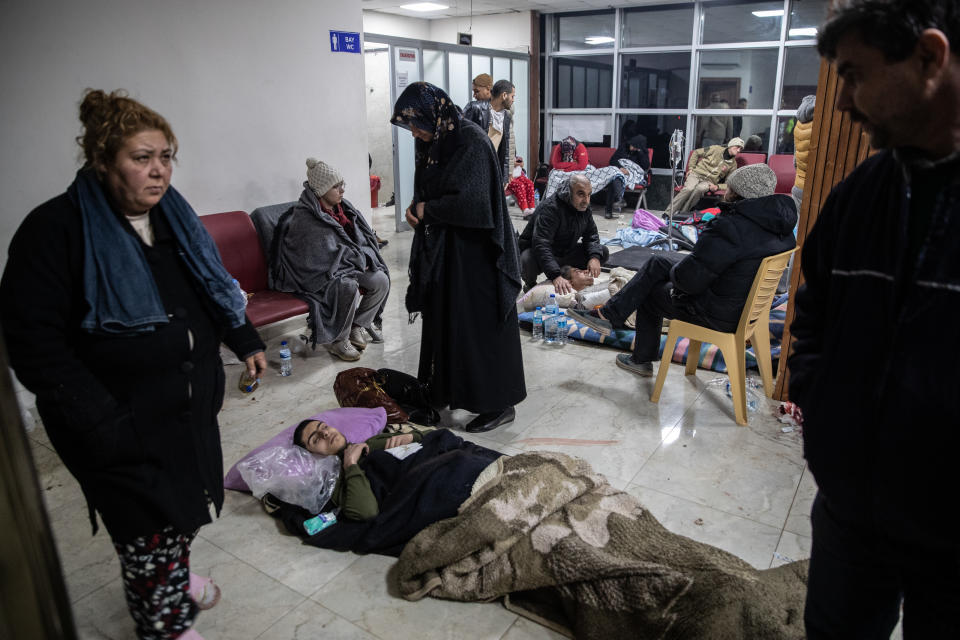 Wounded earthquake survivors wait to be treated in Iskenderun, Turkey