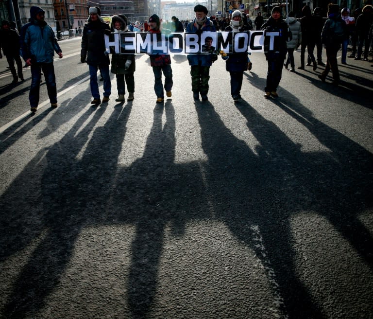 Several thousand Muscovites marched in memory of Kremlin critic Boris Nemtsov who was gunned down three years ago, a rare sanctioned opposition gathering ahead of next month's presidential vote