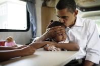 <p>In 2007, Obama gave Sasha a kiss on her head while playing cards on the presidential campaign trail. </p>