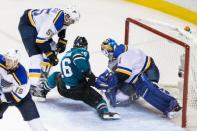 May 25, 2016; San Jose, CA, USA; San Jose Sharks center Nick Spaling (16) tries to score against St. Louis Blues goalie Brian Elliott (1) in the third period of game six in the Western Conference Final of the 2016 Stanley Cup Playoffs at SAP Center at San Jose. The Sharks won 5-2. Mandatory Credit: John Hefti-USA TODAY Sports