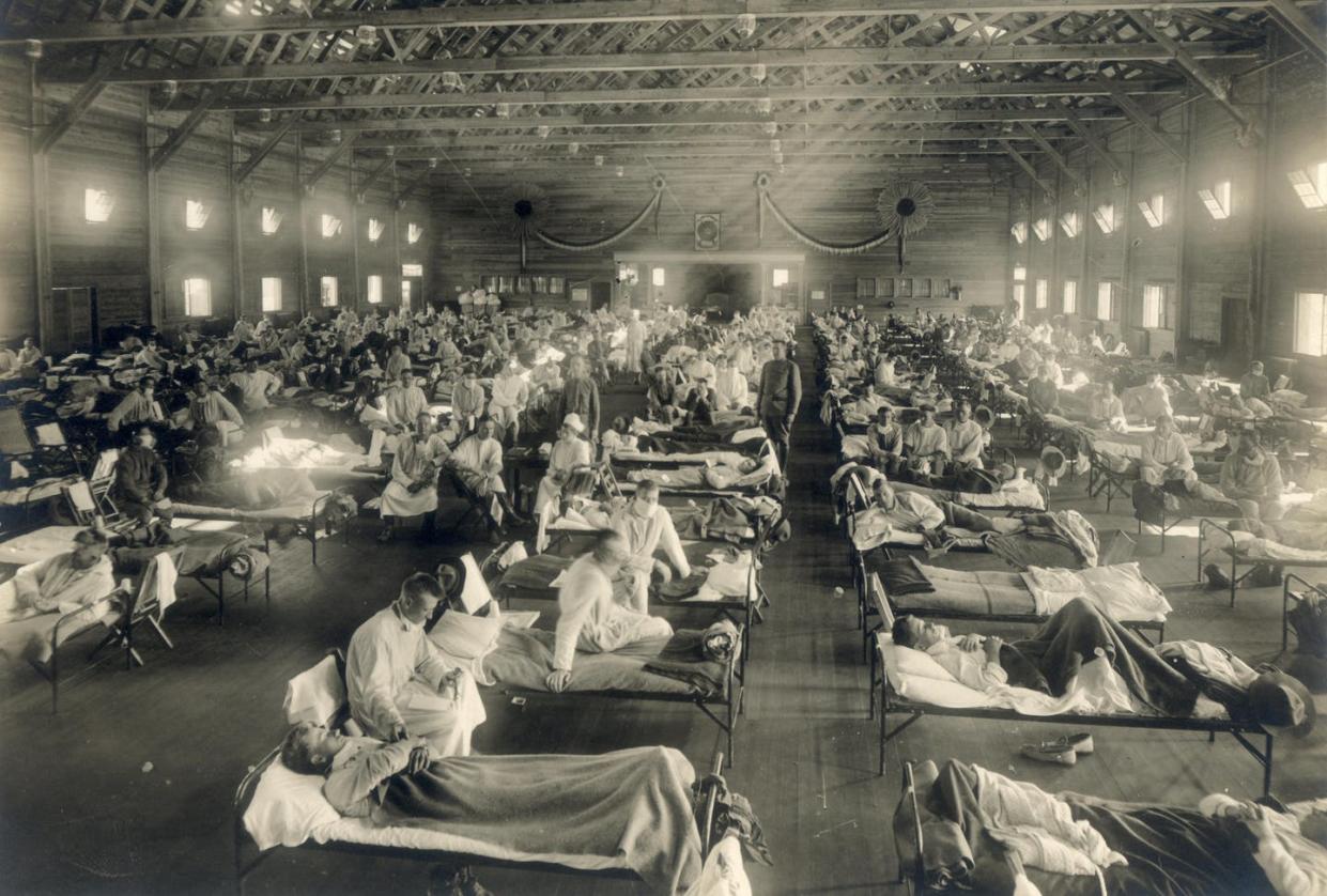 <span class="caption">Emergency hospital during influenza epidemic at Camp Funston in Kansas around 1918. </span> <span class="attribution"><a class="link " href="https://commons.wikimedia.org/wiki/File:Emergency_hospital_during_Influenza_epidemic,_Camp_Funston,_Kansas_-_NCP_1603.jpg" rel="nofollow noopener" target="_blank" data-ylk="slk:National Museum of Health and Medicine;elm:context_link;itc:0;sec:content-canvas">National Museum of Health and Medicine</a></span>