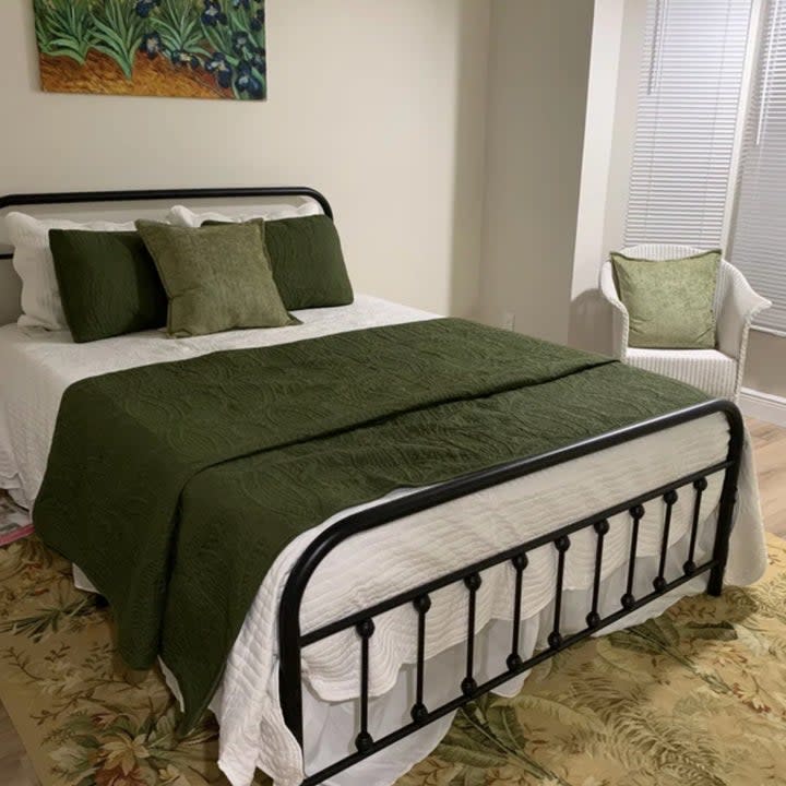 A reviewer's olive coverlet