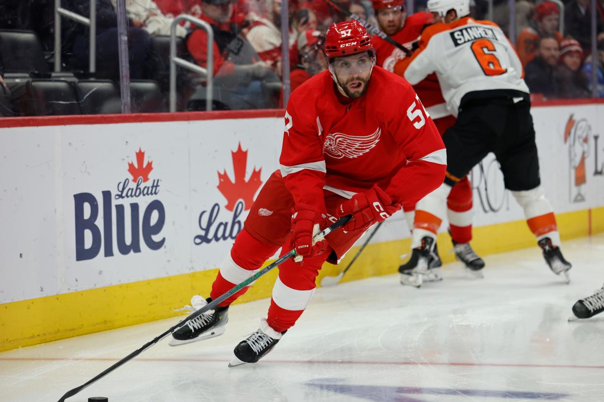 Detroit Red Wings left wing David Perron (57) skates with the puck in the second period against the Philadelphia Flyers at Little Caesars Arena in Detroit on Thursday, Jan. 25, 2024.