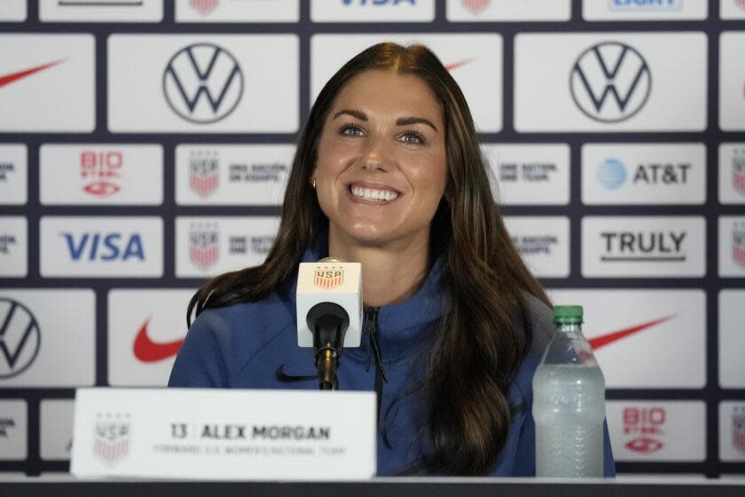 Alex Morgan speaks to reporters during the 2023 Women's World Cup media day for the United States Women's National Team in Carson, Tuesday, June 27, 2023. (AP Photo/Ashley Landis)