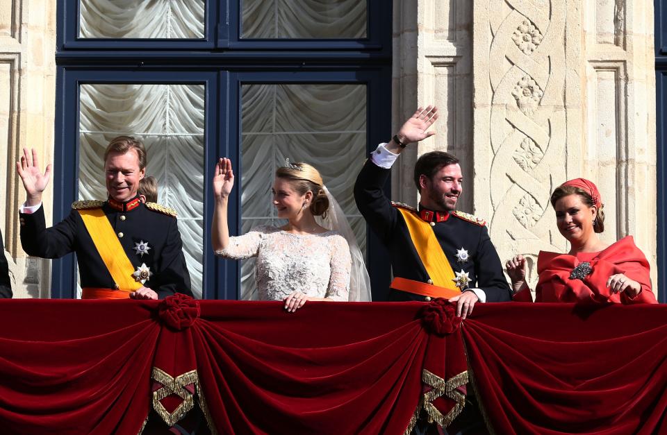 LUXEMBOURG - OCTOBER 20: (L-R) Grand Duke Henri of Luxembourg, Princess Stephanie of Luxembourg, Prince Guillaume Of Luxembourg and Grand Duchess Maria Teresa of Luxembourg wave to the crowds from the balcony of the Grand-Ducal Palace the wedding ceremony of Prince Guillaume Of Luxembourg and Princess Stephanie of Luxembourg at the Cathedral of our Lady of Luxembourg on October 20, 2012 in Luxembourg, Luxembourg. The 30-year-old hereditary Grand Duke of Luxembourg is the last hereditary Prince in Europe to get married, marrying his 28-year old Belgian Countess bride in a lavish 2-day ceremony. (Photo by Andreas Rentz/Getty Images)