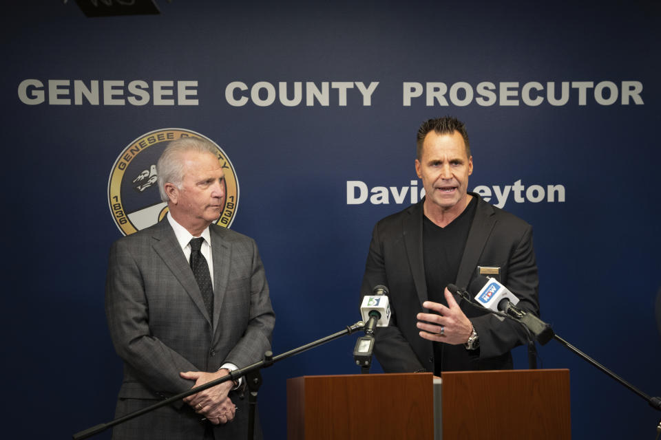 Genesee County Sheriff Chris Swanson speaks alongside Genesee County Prosector David Leyton during a press conference at Genesee County Prosecutor's office in Flint, Mich., on Tuesday, March 19, 2024, announcing Congressman Dan Kildee's brother has been murdered in Vienna Township on Tuesday morning. (Julian Leshay Guadalupe/The Flint Journal via AP)