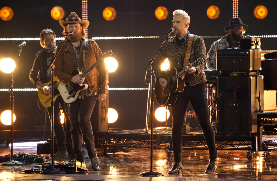 John Osborne, left, and T.J. Osborne of Brothers Osborne performs "Dead Man's Curve" at the 64th Annual Grammy Awards on Sunday, April 3, 2022, in Las Vegas. (AP Photo/Chris Pizzello)