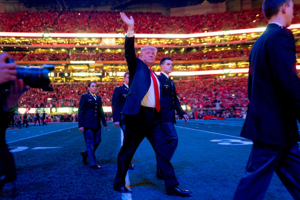 <p>President Donald Trump walks off the field following the national anthem before the start of the NCAA National Championship game at Mercedes-Benz Stadium, Monday, Jan. 8, 2018, in Atlanta, between Alabama and Georgia. (AP Photo/Andrew Harnik) </p>