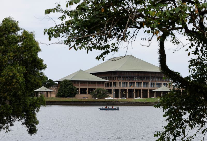 Security personel patrol in the premises of Sri Lanka's Parliament building, in Colombo