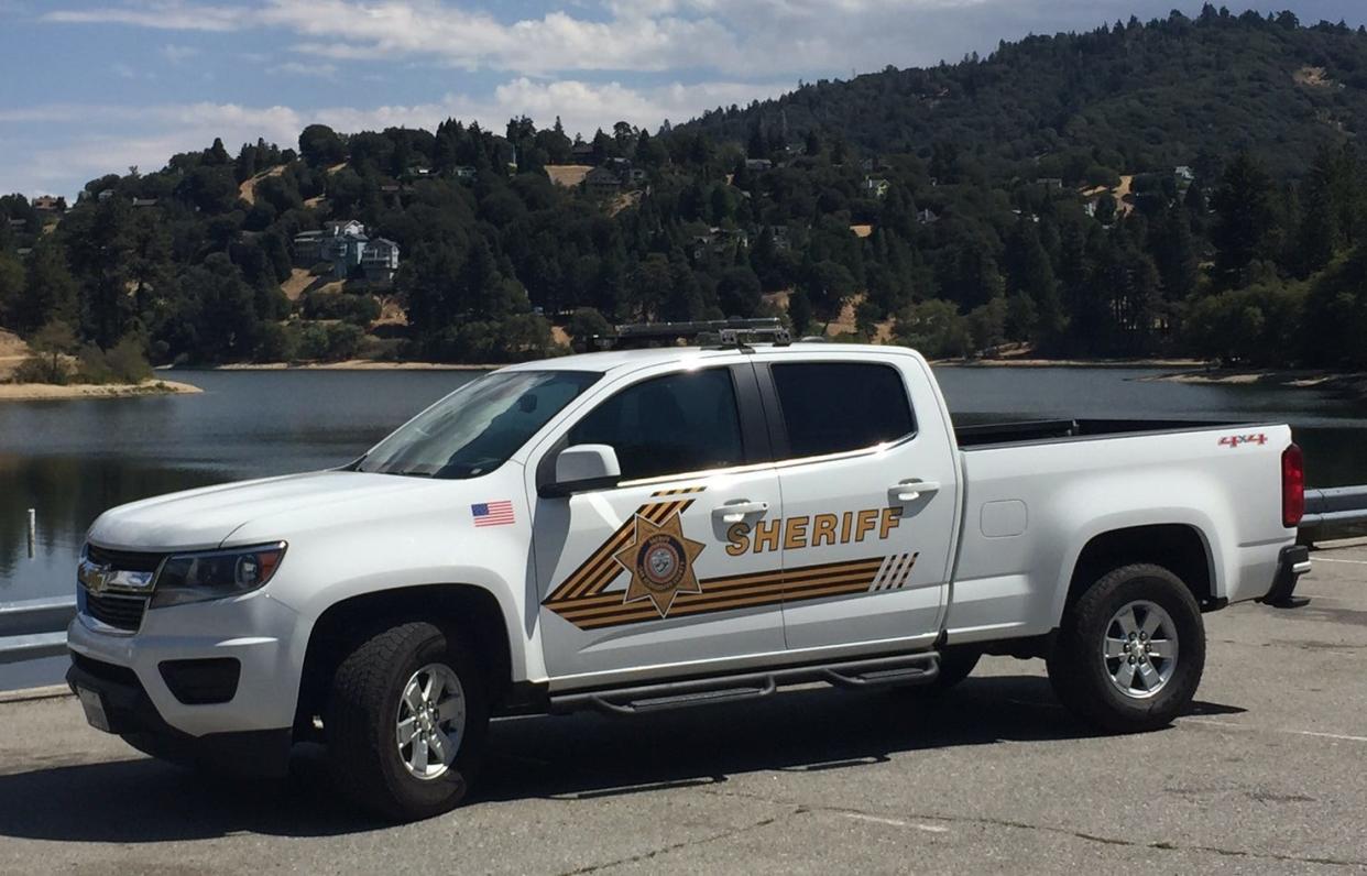 A Crestline man was arrested on suspicion of shooting his neighbor in the mountain community south of Silverwood Lake.