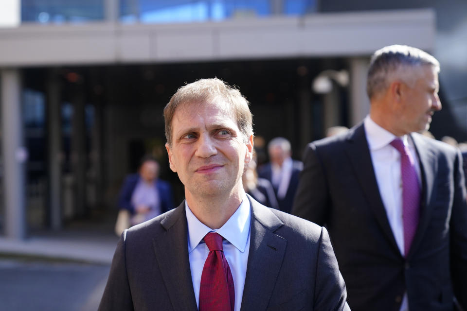 Attorney Justin Nelson, representing Dominion Voting Systems, walks after a news conference outside New Castle County Courthouse in Wilmington, Del., after the defamation lawsuit by Dominion Voting Systems against Fox News was settled just as the jury trial was set to begin, Tuesday, April 18, 2023. (AP Photo/Matt Rourke)