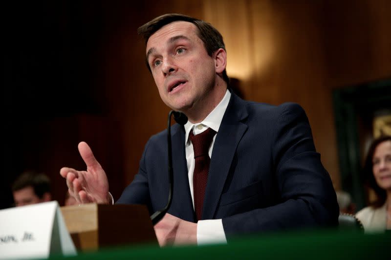 FILE PHOTO: Robert Jackson Jr. testifies to the Senate Banking, Housing and Urban Affairs Committee on his nomination to be a member of the SEC in Washington