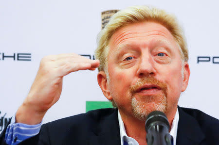 Three-times Wimbledon champion Boris Becker gestures as he is announced as German Tennis Federation's (DTB) new head of men's tennis during a news conference in Frankfurt, Germany, August 23, 2017. REUTERS/Kai Pfaffenbach