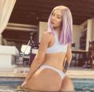 <p>Iggy took to her Instagram over the weekend to share a pool shot showing off her perky behind. Iggy captioned the snap, "Ain’t nothing wrong with a Lil lipstick & a wig in the pool".</p>