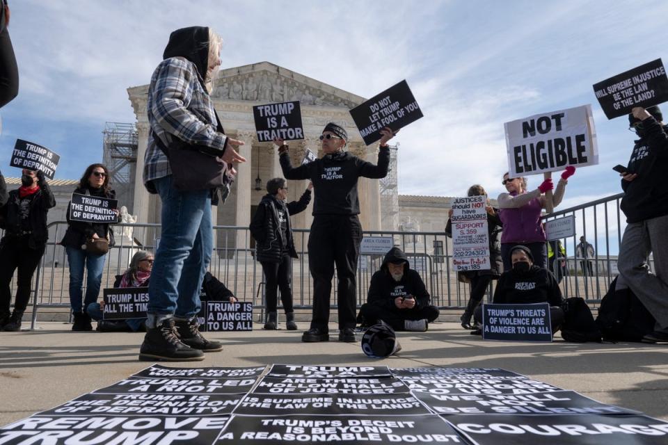 The justices ignored the question of whether then-President Trump ‘engaged in insurrection’ (AFP via Getty)