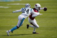 Arizona Cardinals wide receiver DeAndre Hopkins is tackled by Carolina Panthers cornerback Rasul Douglas during the first half of an NFL football game Sunday, Oct. 4, 2020, in Charlotte, N.C. (AP Photo/Brian Blanco)