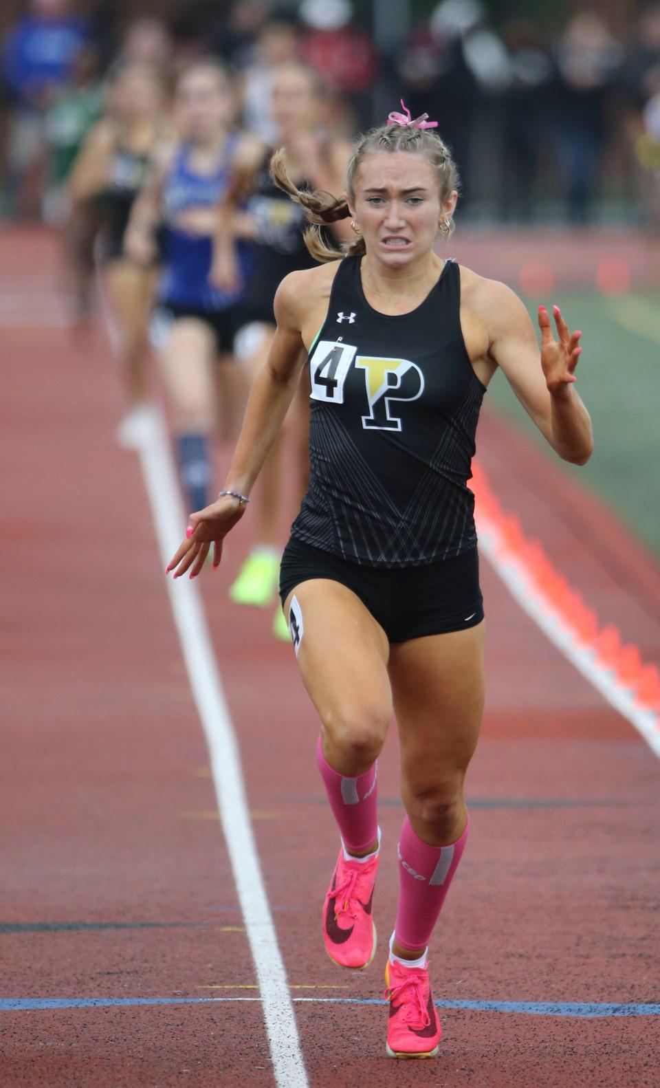 Padua's Molly Flanagan wins the Division I 800 meter race during the second day of the DIAA state high school track and field championships at Dover High School, Saturday, May 18, 2024.