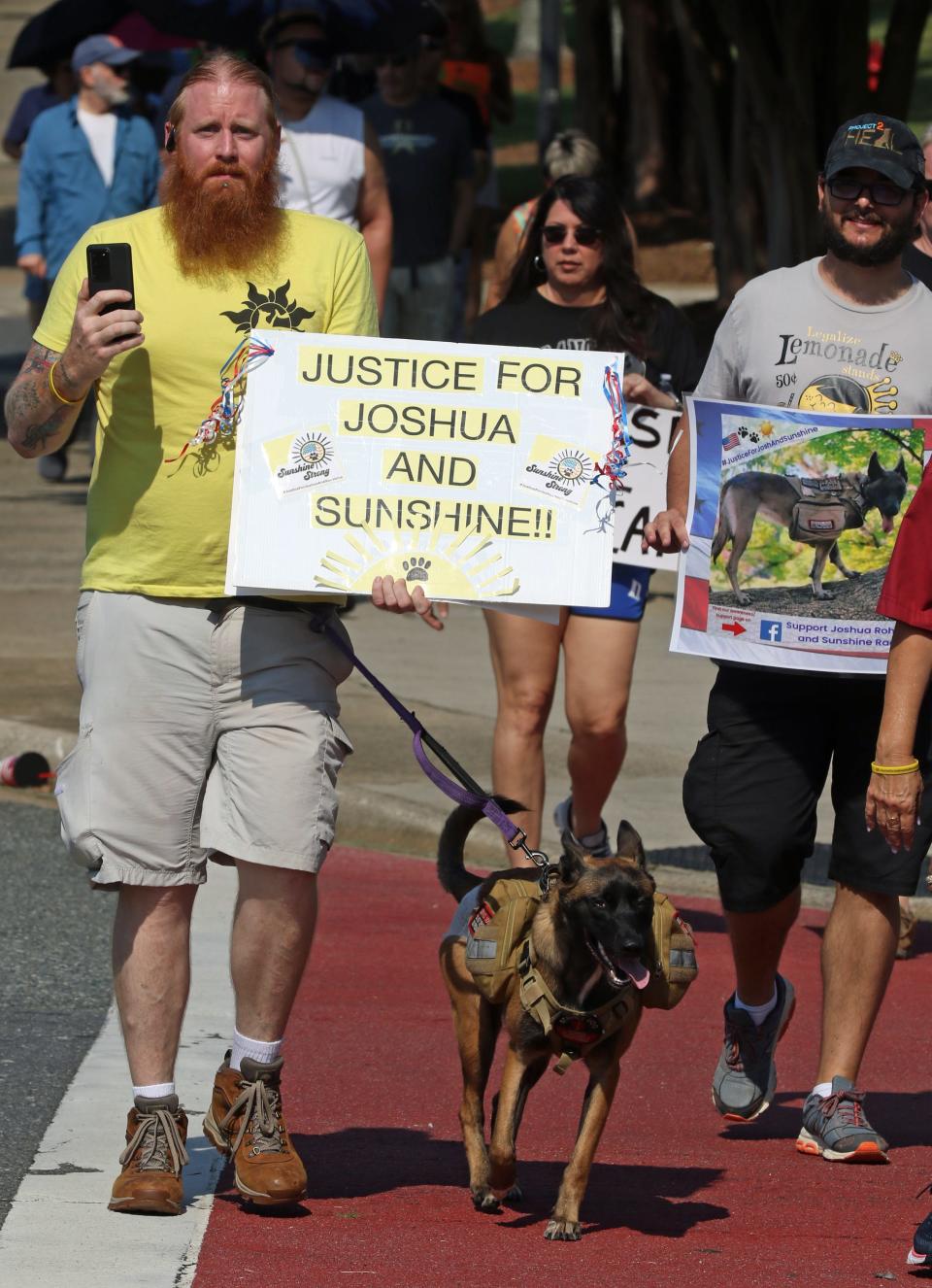 Joshua Rohrer was one of over 50 marchers that walked along Long Avenue Saturday morning, July 16, 2022. during the Community Walk for Love and Peace.