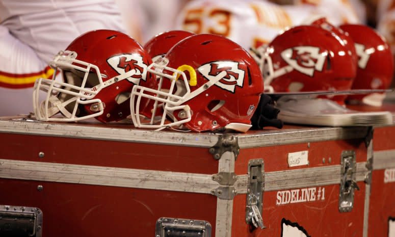 A picture of four Kansas City Chiefs helmets.