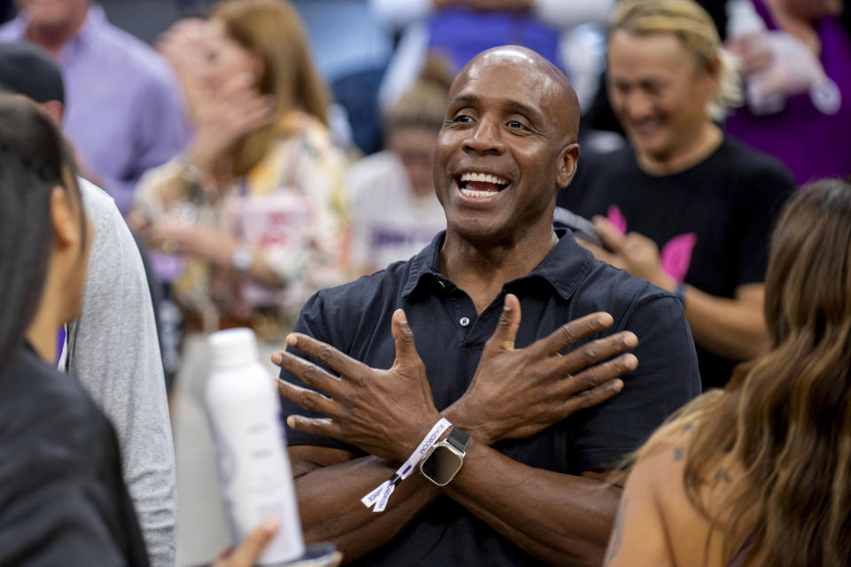 FILE - Former San Francisco Giants slugger Barry Bonds attends an NBA basketball game between the Portland Trail Blazers and Sacramento Kings in Sacramento, Calif., Wednesday, Oct. 19, 2022. Steroids-tainted stars Barry Bonds, Roger Clemens and Rafael Palmeiro are on the eight-man ballot for the Hall of Fame’s contemporary baseball era committee, which meets Sept. 4 in San Diego. (AP Photo/José Luis Villegas, File)