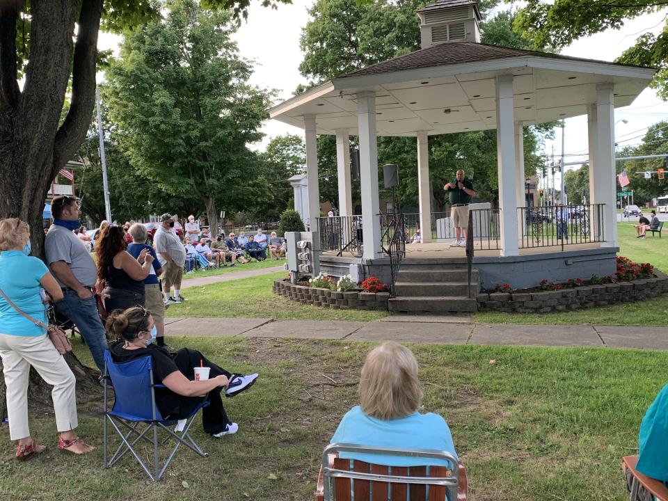 Whitesboro, New York, Mayor Bob Friedlander speaks to residents about potential grant money available through the Federal Emergency Management Agency (FEMA) for home buyouts.