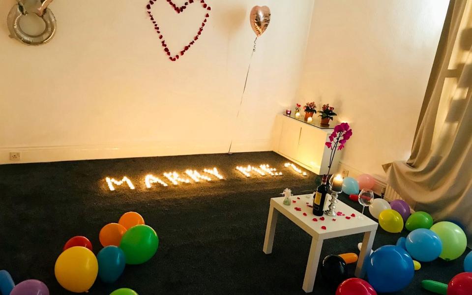 Mr Ndreu spelled out 'Marry me?' in tea lights but it didn't go to plan - SWNS