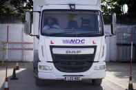 Learner truck driver Cadhene Lubin-Hewitt practices a reversing manoeuvre in a truck at the National Driving Centre in Croydon, south London, Wednesday, Sept. 22, 2021. Lubin-Hewitt, 32, moved to the UK when he was 16 from Trinidad and Tobago and has been driving buses and coaches for about 10 years. Britain doesn't have enough truck drivers. The shortage is contributing to scarcity of everything from McDonald's milkshakes to supermarket produce. (AP Photo/Matt Dunham)