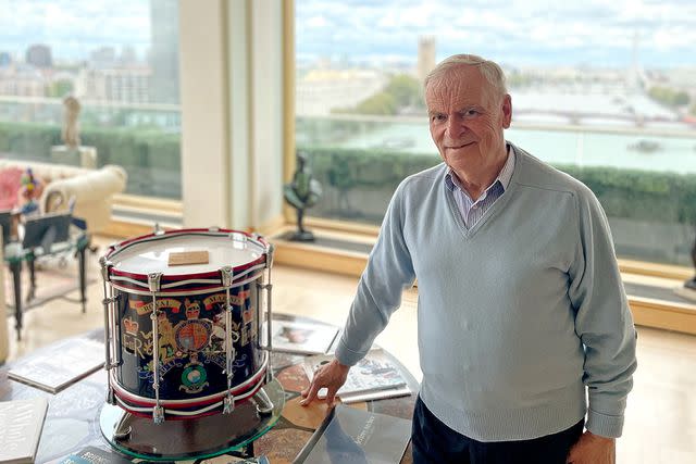 <p>Simon Perry</p> Jeffrey Archer with a drum that was played by marines at Queen Elizabeth's funeral in September 2022