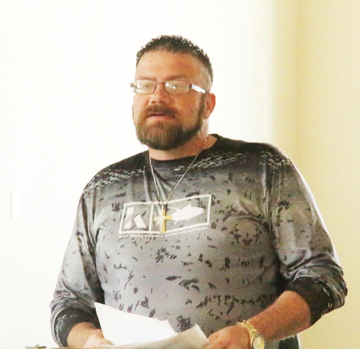 Charles Phinney addresses the audience at his drug court graduation ceremony Friday, March 31. Phinney, who has been sober for 14 months, made it through the program in 18 months and one week.