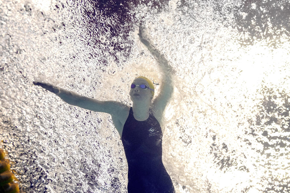 Mollie O'Callaghan, of Australia, competes in the women's 100-meter freestyle final at the World Swimming Championships in Fukuoka, Japan, Friday, July 28, 2023. O'Callaghan won the race. (AP Photo/David J. Phillip)