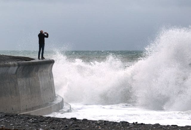 Waves on a harbour wall