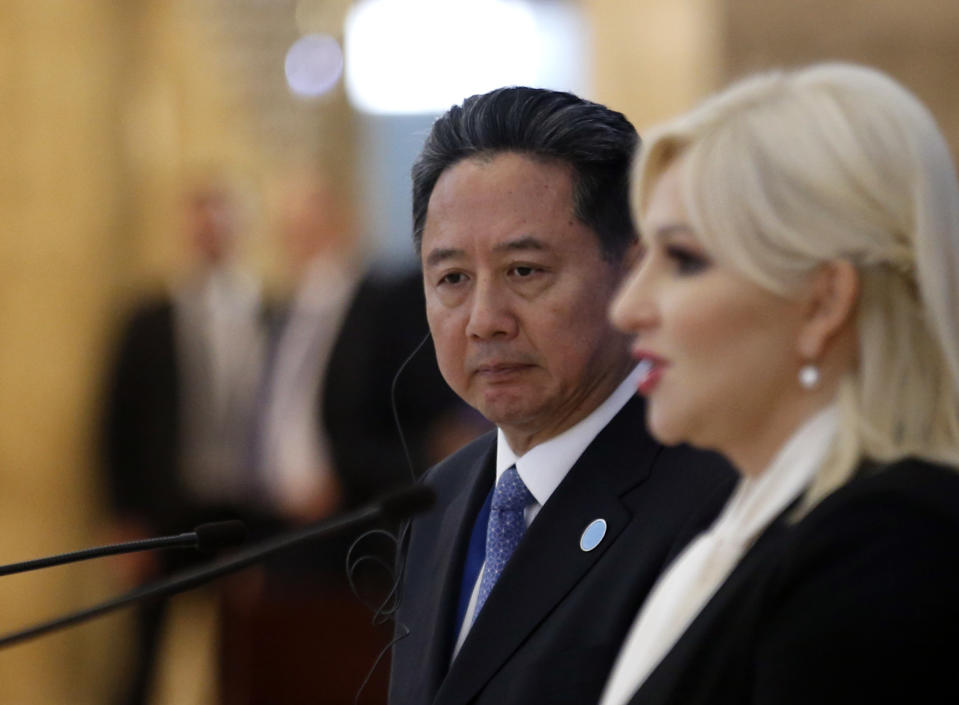 Chinese Transport Minister Li Xiaopeng, listens to Serbian Minister of Construction Zorana Mihajlovic during a press conference after a meeting of China and 16 countries of central and eastern Europe in Belgrade, Serbia, Tuesday, Oct. 16, 2018. The gathering focusing on transport is part of China's "New Silk Road" initiative to increase global influence through economic links and investment. (AP Photo/Darko Vojinovic)