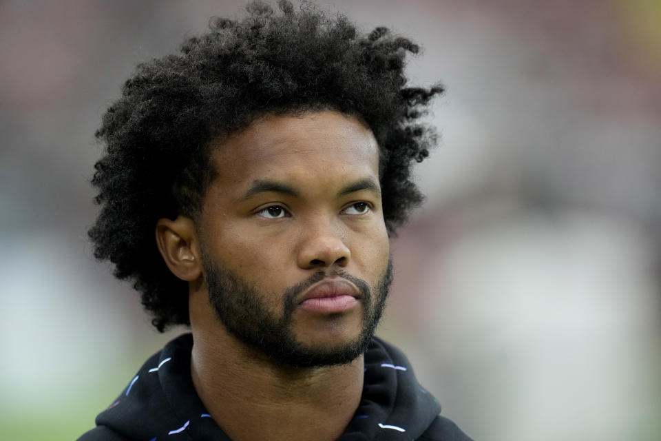 Arizona Cardinals quarterback Kyler Murray watches during an NFL football game against the Cincinnati Bengals , Sunday, Oct. 8, 2023, in Glendale, Ariz. (AP Photo/Ross D. Franklin)