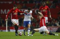 Britain Football Soccer - Manchester United v Wigan Athletic - FA Cup Fourth Round - Old Trafford - 29/1/17 Wigan Athletic's Sam Morsy in action with Manchester United's Bastian Schweinsteiger and Henrikh Mkhitaryan Reuters / Phil Noble Livepic EDITORIAL USE ONLY. No use with unauthorized audio, video, data, fixture lists, club/league logos or "live" services. Online in-match use limited to 45 images, no video emulation. No use in betting, games or single club/league/player publications. Please contact your account representative for further details.