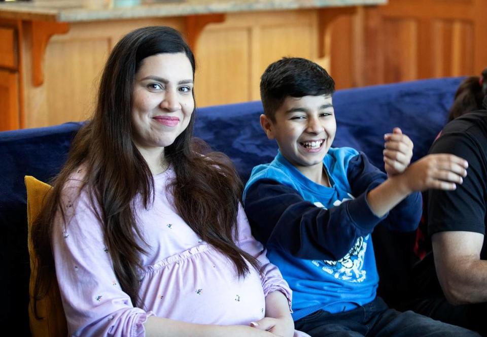 Negina Barakazai and her 12-year-old son, Ben Yamin relax in their new Cambria home. The Barakazai family spent more than two years in hiding in Afghanistan and Pakistan before arriving in the United States on Sept. 6, 2023.