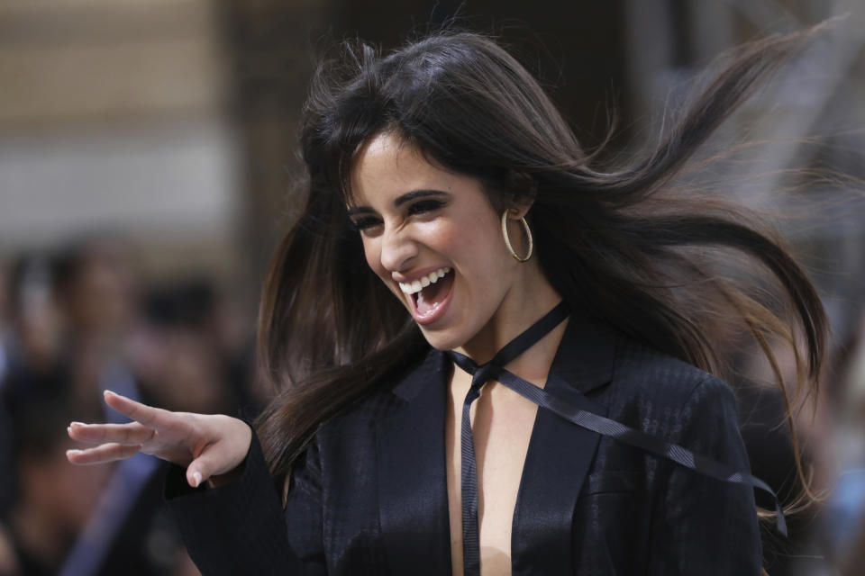 Singer Camila Cabello wears a creation as part of the L'Oreal Ready To Wear Spring-Summer 2020 collection, unveiled during the fashion week, in Paris, Saturday, Sept. 28, 2019. (Photo by Vianney Le Caer/Invision/AP)