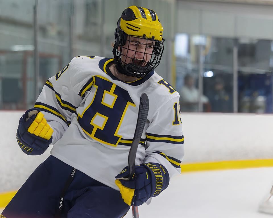 Hartland's LJ Sabala celebrates his first-period goal during a 6-1 victory over Clarkston in a regional championship game Wednesday, March 1, 2023.