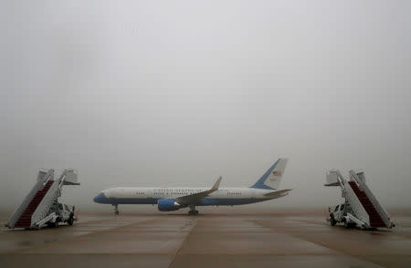 Air Force One prepares to depart for travel to Pennsylvania with U.S. President Donald Trump and first lady Melania Trump onboard from Joint Base Andrews in Maryland, U.S., September 11, 2018. Reuters photographer Leah Millis: "I took this photograph from the motorcade as we drove by this eerie scene of fog surrounding Air Force One. It was lined up like that for a split second." REUTERS/Leah Millis