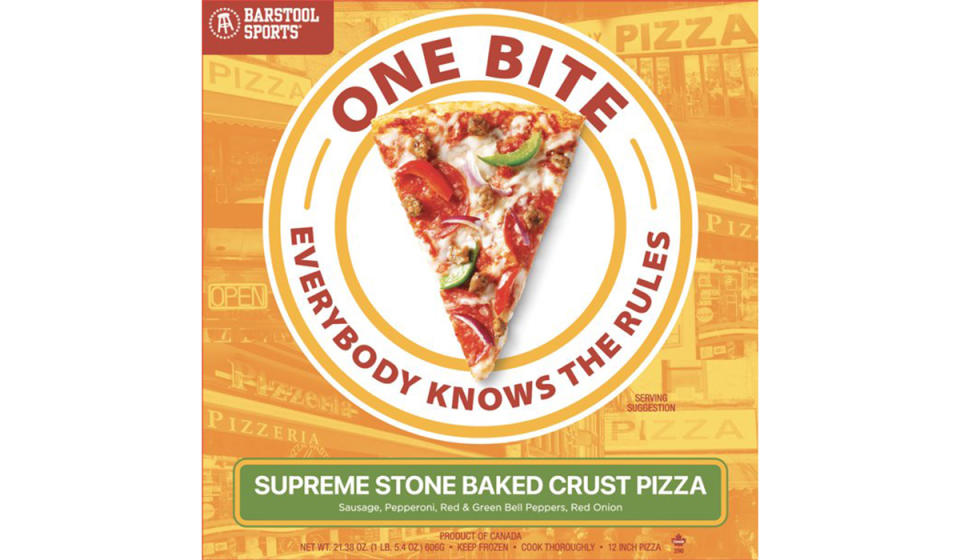 Yellow box of One Bite brand supreme pizza with slice shown on box. 